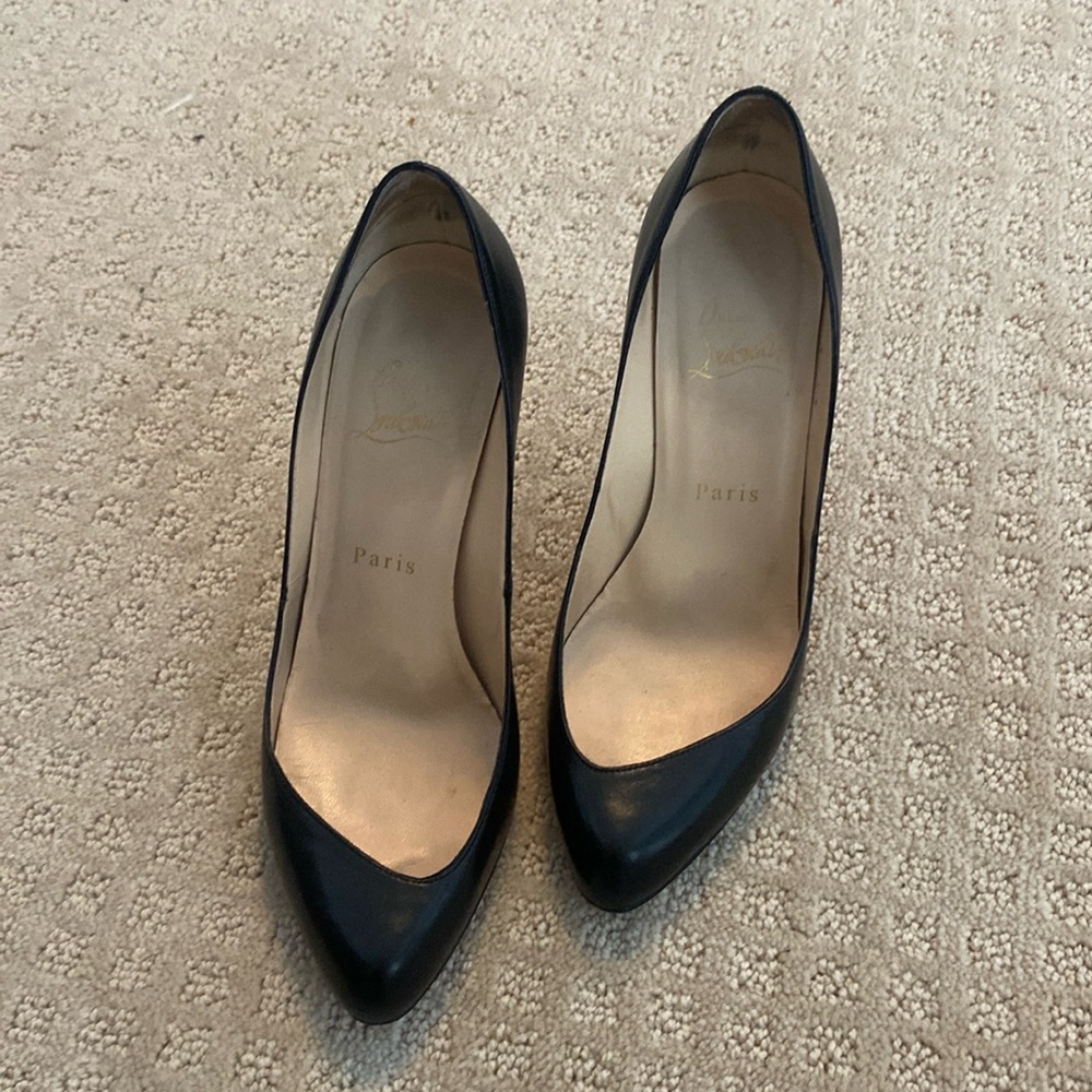Christian Louboutin black pumps